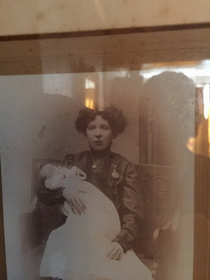 Nonty in his mother's arms