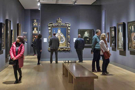 People looking at pictures